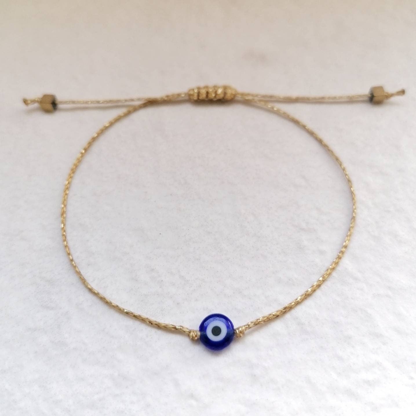 Glima Gold Evil Eye Bracelet – Dainty Hematite Amulet for Protection