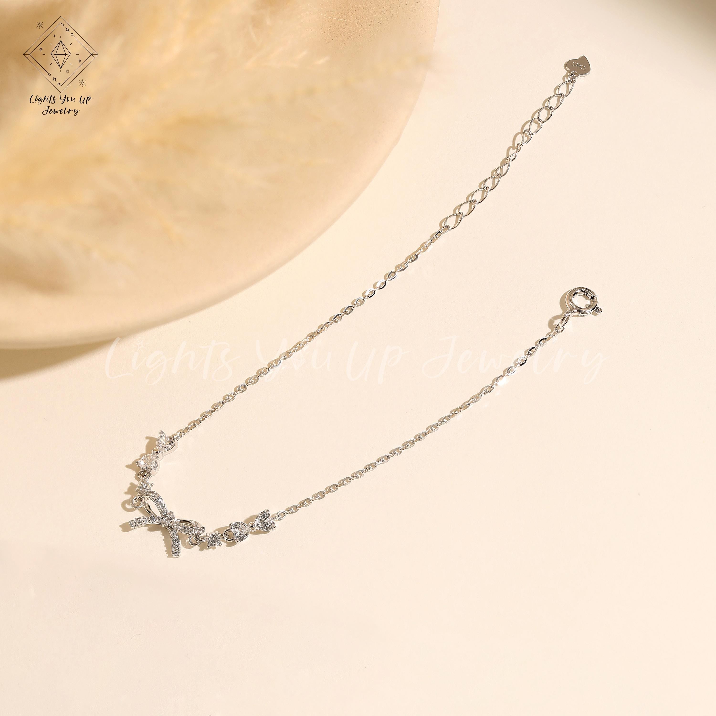 Glima Ribbon Knot Bracelet – Dainty S925 Silver & Gold with Diamond Bling