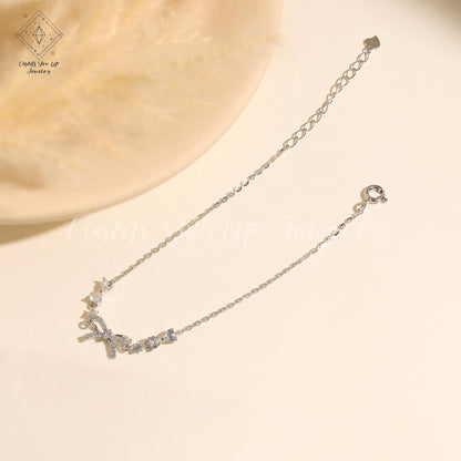 Glima Ribbon Knot Bracelet – Dainty S925 Silver & Gold with Diamond Bling